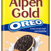 Шоколад молочный ALPEN GOLD Орео класический чизкейк с начинкой с добававлением сухого сыра и кусочками печенья, 90г 1 шт